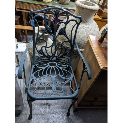269 - A green painted metal garden table and one armchair.
Location: G
If there is no condition report sho... 