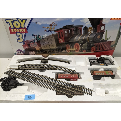 397 - A Hornby Disney Pixar Toy Story 3 train set, boxed, incomplete, with three rolling stock carriages, ... 