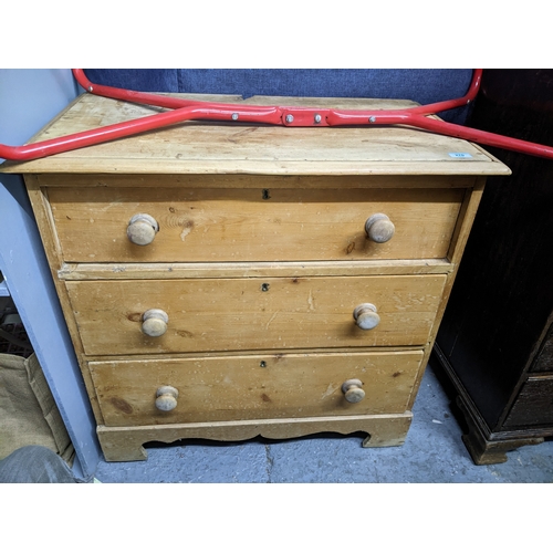 270 - A Victorian pine chest of three drawers with bun handles on bracket feet, 81 x 84 x 46cms.
Location:... 