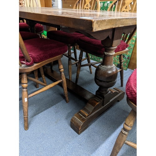 278 - A set of six 1950s Windsor wheel back dining chairs in elm, ash and beech, with detachable red cushi... 