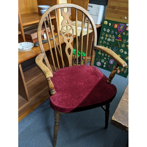278 - A set of six 1950s Windsor wheel back dining chairs in elm, ash and beech, with detachable red cushi... 