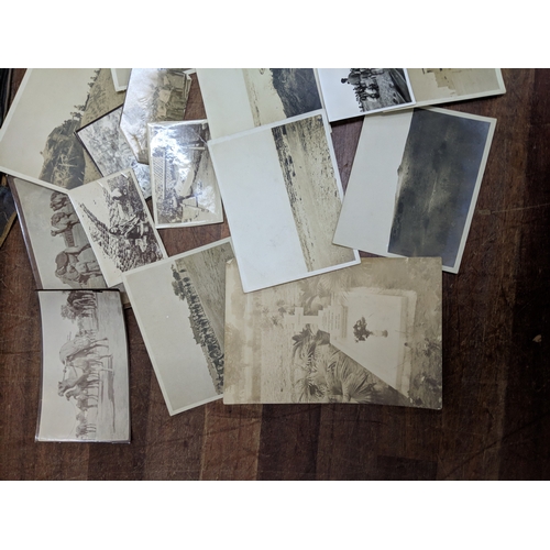 191 - A scrapbook containing photographs of conflicts, photos of landmark and some postcards of landmarks ... 
