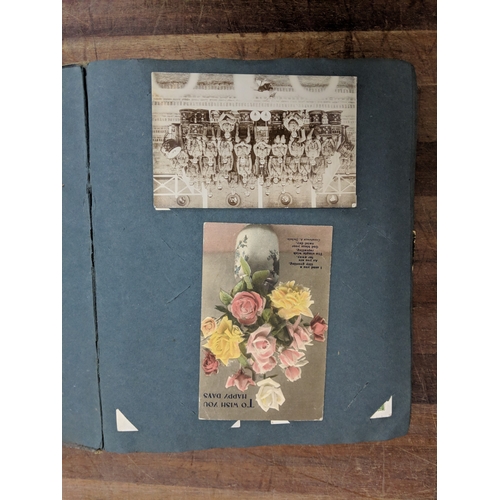 191 - A scrapbook containing photographs of conflicts, photos of landmark and some postcards of landmarks ... 