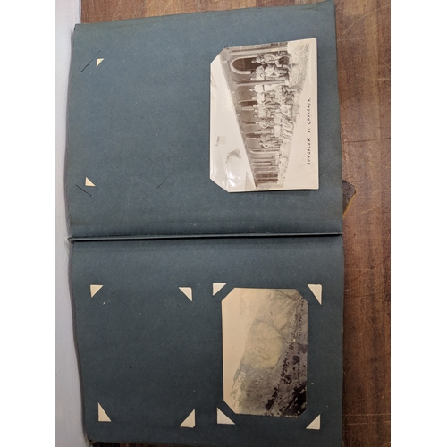 191 - A scrapbook containing photographs of conflicts, photos of landmark and some postcards of landmarks ... 