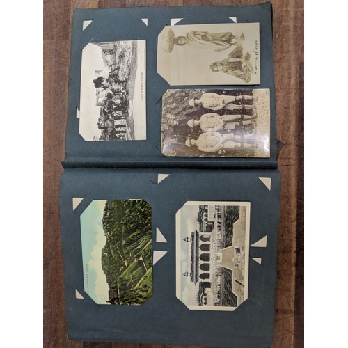 191 - A scrapbook containing photographs of conflicts, photos of landmark and some postcards of landmarks ... 