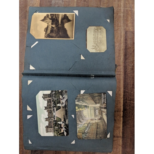 191 - A scrapbook containing photographs of conflicts, photos of landmark and some postcards of landmarks ... 