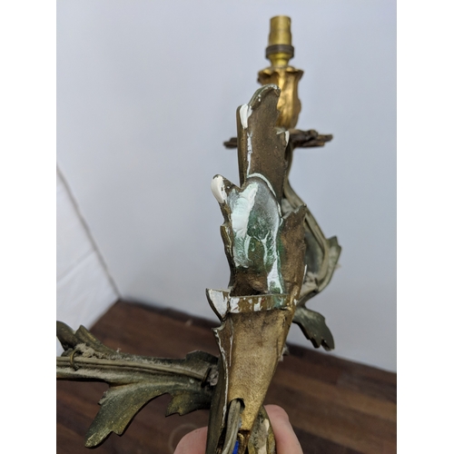 192 - A pair of French Louis XV style brass wall sconces with a gilded finish
Location:
If there is no con... 