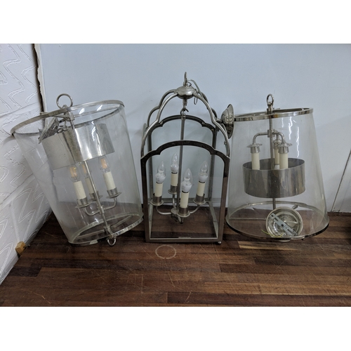195 - A pair of modern chrome framed centre lights and another similar Location:
 If there is no condition... 