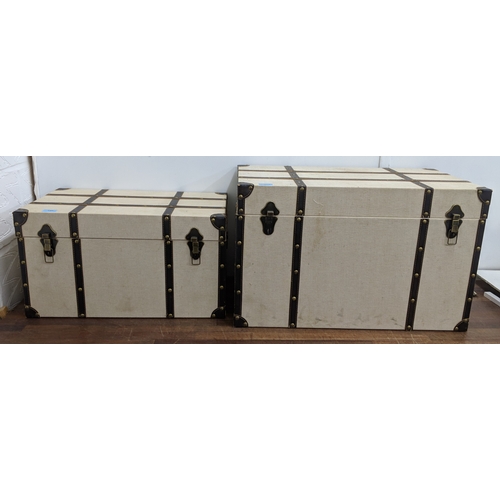 196 - Two modern canvas and leather trunks 68.5 w x 43cm h and 59cm w x 32.5cm h Location:
If there is no ... 