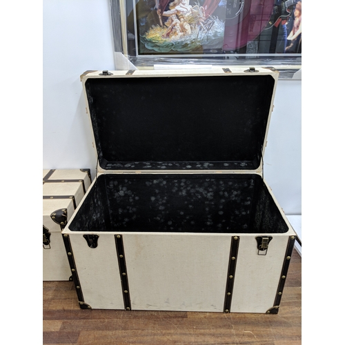 196 - Two modern canvas and leather trunks 68.5 w x 43cm h and 59cm w x 32.5cm h Location:
If there is no ... 
