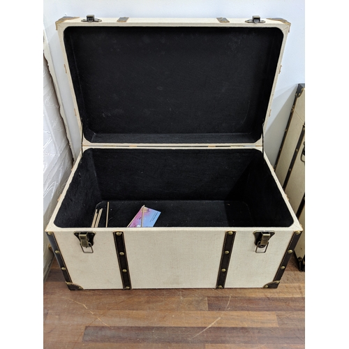 196 - Two modern canvas and leather trunks 68.5 w x 43cm h and 59cm w x 32.5cm h Location:
If there is no ... 