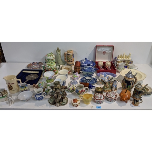 203 - A mixed lot to include blue and white china, Lurpak promotional items, modern beer steins, The Villa... 