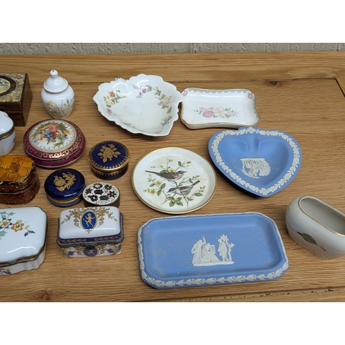 328 - Small collectables to include an assortment of porcelain trinkets comprising examples by Limoges, Ro... 