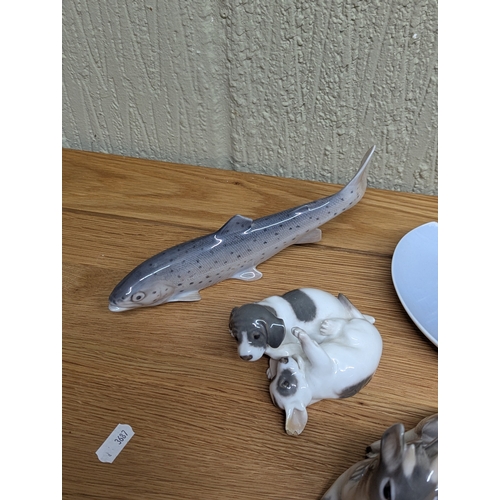 329 - Royal Copenhagen to include a Great Crested grebe, n Airedale terrier and a fawn and other items, so... 