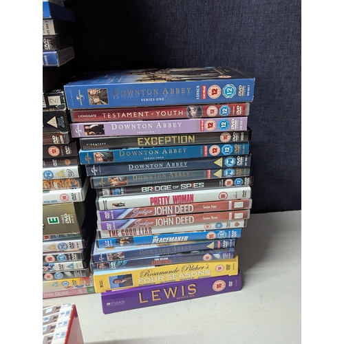 339 - A large collection of assorted DVDs and box sets to include Only Fools and Horses, Indiana Jones, Hi... 