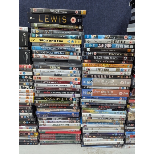 339 - A large collection of assorted DVDs and box sets to include Only Fools and Horses, Indiana Jones, Hi... 