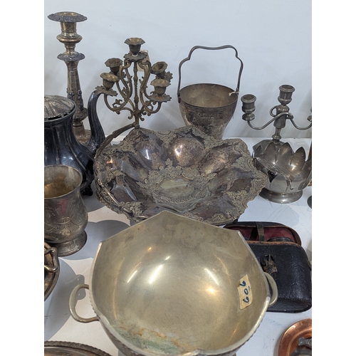 40 - Mixed metalware to include a silver plated basket having a flared scalloped embossed rim with swing ... 