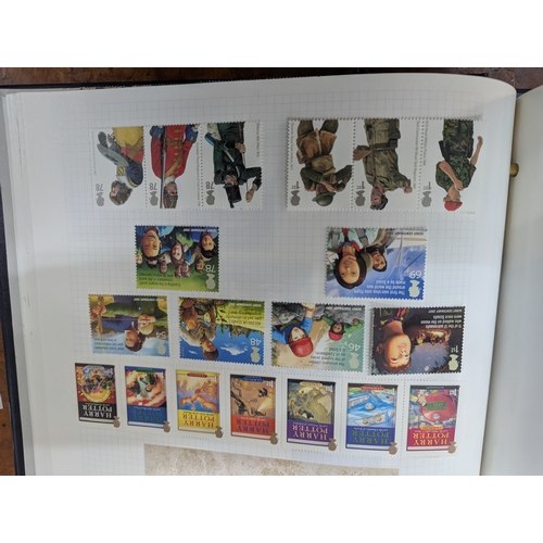 43 - An album filled with Royal Mail postage stamps containing over 1000 First Class postage stamps along... 