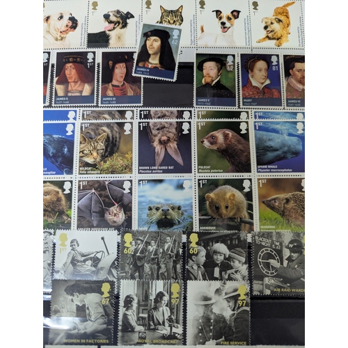 45 - An album filled with Royal Mail postage stamps containing over 1300 First Class postage stamps along... 