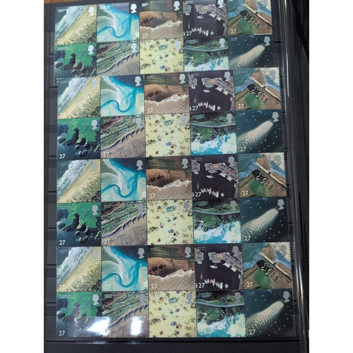 52 - An album filled with Royal Mail postage stamps to include over 100 first class examples along with o... 