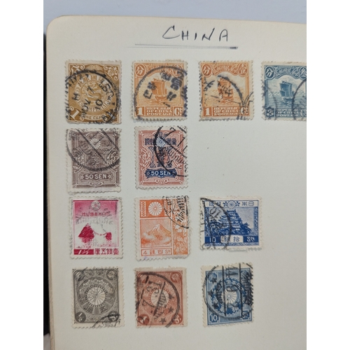 53 - A collection of world postage stamps to include Chinese, Palestine, Uganda, Germany and other exampl... 