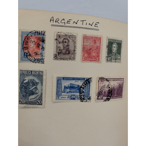 53 - A collection of world postage stamps to include Chinese, Palestine, Uganda, Germany and other exampl... 