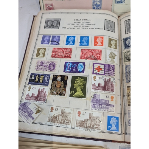 53 - A collection of world postage stamps to include Chinese, Palestine, Uganda, Germany and other exampl... 