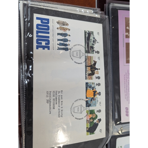 54 - A large quantity of First Day covers all within albums. to include commemorative examples, TV soap r... 