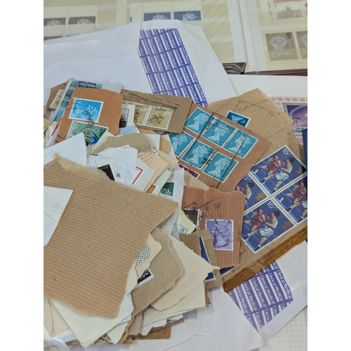 58 - A large collection of postage stamps from around the world to include commemorative examples, exampl... 