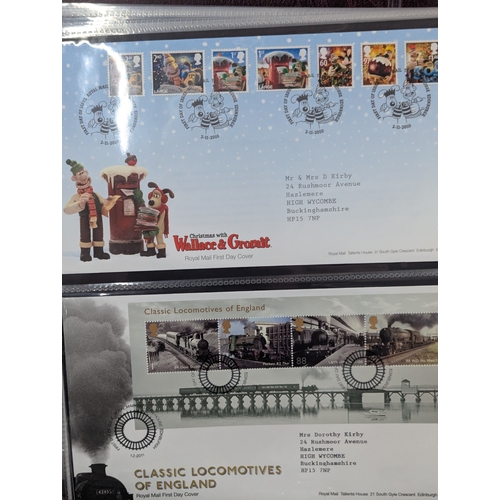 59 - A large collection of First Day covers to include commemorative examples and others housed within al... 