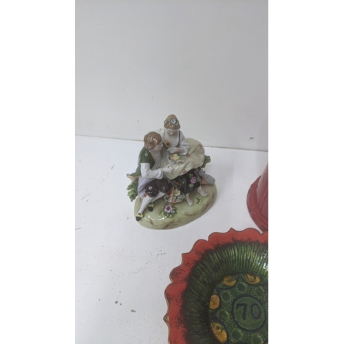 239 - Novelty items to include a cast iron Michelin Man, a Jelly Belly sweet dispenser and other items Loc... 
