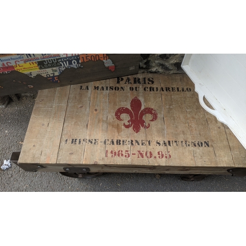 241 - A mixed lot to include a timber cart on wheels titled Paris La Maison du Chiarello 1965 No. 95 and o... 