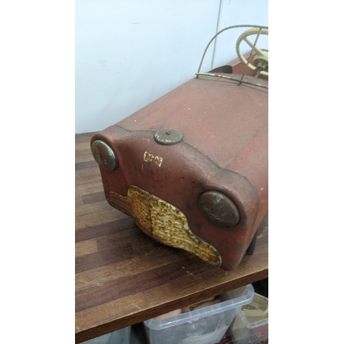 242 - A vintage Triang cast metal child's pedal car named Thunderbold Location:
If there is no condition r... 