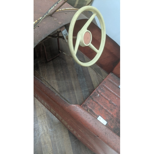 242 - A vintage Triang cast metal child's pedal car named Thunderbold Location:
If there is no condition r... 