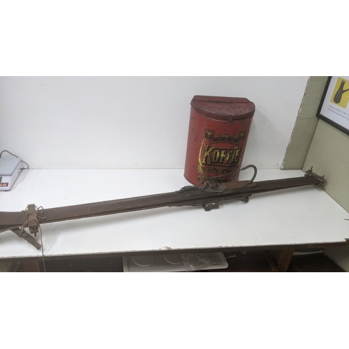 243 - A vintage set of skis along with a galvanised metal Koffie Bin Location:
If there is no condition re... 