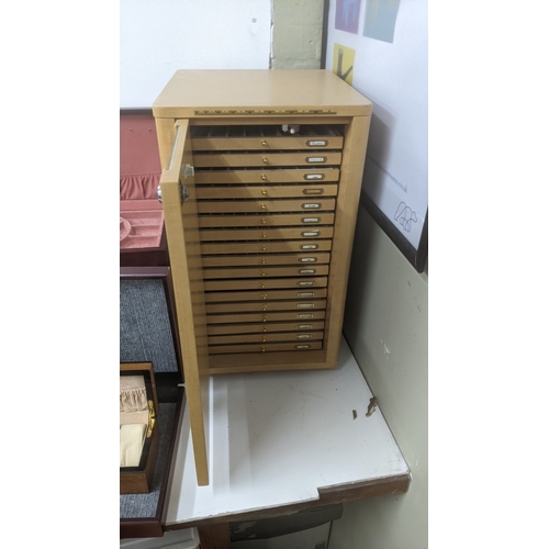 247 - Display and collectors boxes to include a rotating Condor watch strap display cabinet, a Thomas Pacc... 
