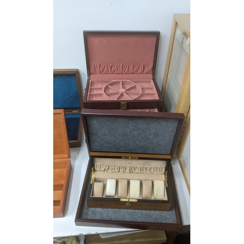 247 - Display and collectors boxes to include a rotating Condor watch strap display cabinet, a Thomas Pacc... 