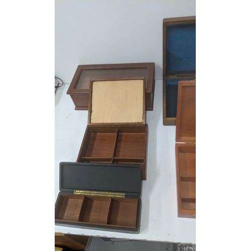 247 - Display and collectors boxes to include a rotating Condor watch strap display cabinet, a Thomas Pacc... 