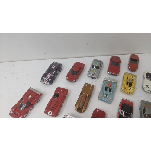 376 - A collection of 1:43 scale diecast model racing cars to include a Best Models E-Type Jaguar, a Top m... 