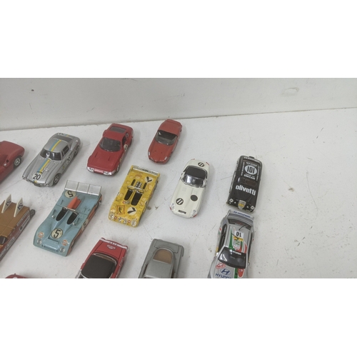376 - A collection of 1:43 scale diecast model racing cars to include a Best Models E-Type Jaguar, a Top m... 