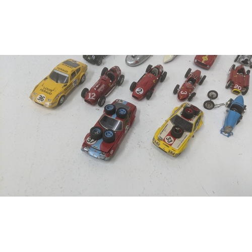 376 - A collection of 1:43 scale diecast model racing cars to include a Best Models E-Type Jaguar, a Top m... 