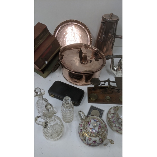 379 - Homeware and kitchenalia to include a silver plated muffin dish, a salter No50 set of kitchen scales... 