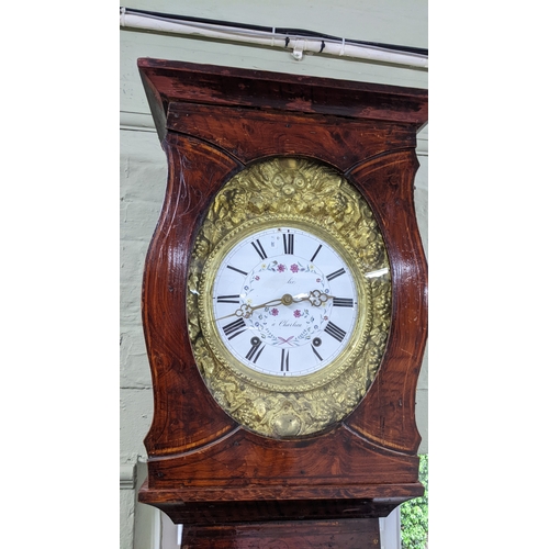 14 - A 19th century French Comtoise, the enamel dial with Roman numerals and floral decoration, housed in... 