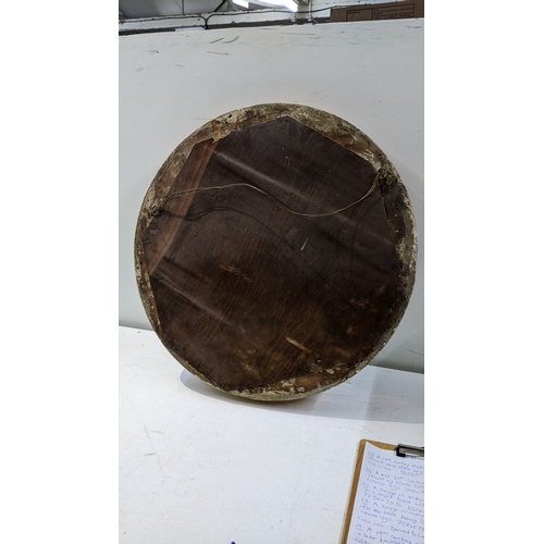 19 - A 19th century gilt butlers mirror having a later bevelled glass plate with applied roundels, 62cm d... 