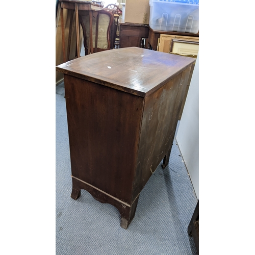 299 - An early 20th century mahogany bow fronted chest of four long drawers, 76cm h x 65.5cm w
Location:
I... 