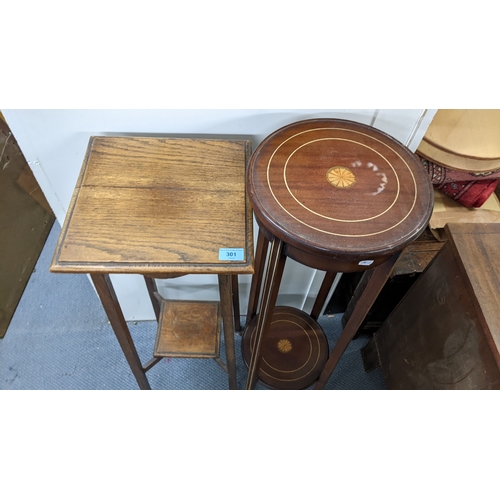 301 - Two early 20th century torchere stands to include an Edwardian mahogany marquetry inlaid table, 98cm... 