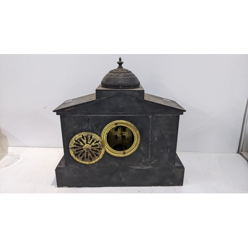 302 - A late Victorian black slate marble 8-day mantel clock of Grecian architectural design, with brocot ... 