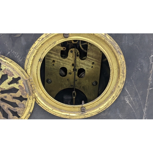 302 - A late Victorian black slate marble 8-day mantel clock of Grecian architectural design, with brocot ... 