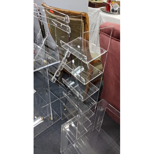314 - Contemporary Perspex furniture to include two folding chairs, side table, bookcase and two occasiona... 