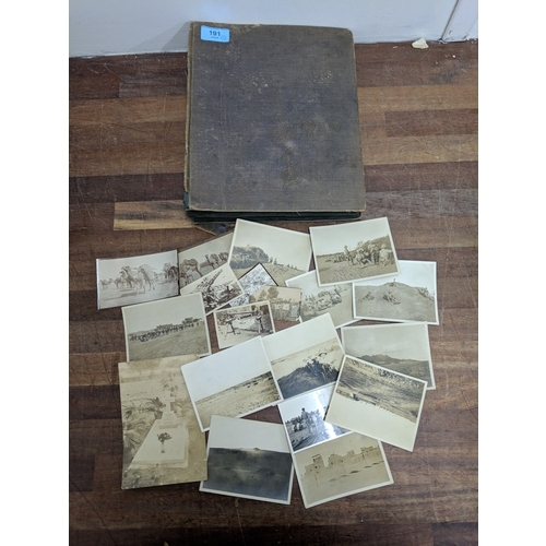 191 - A scrapbook containing photographs of conflicts, photos of landmark and some postcards of landmarks ... 